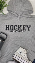 Load and play video in Gallery viewer, Hockey Mom Hoodie - Sport Grey
